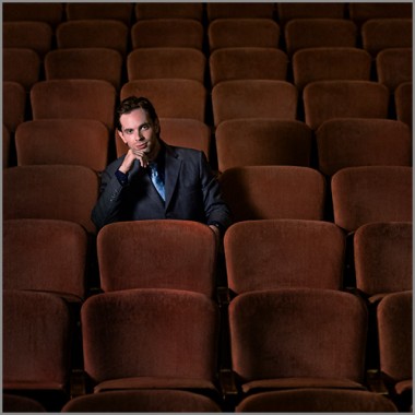 modern grooms portrait at paramount theater aurora